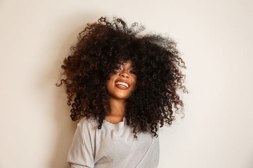 Beauty portrait of african american woman with afro hairstyle and